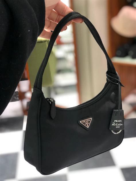 prada city bag black|black prada bag with pouch.